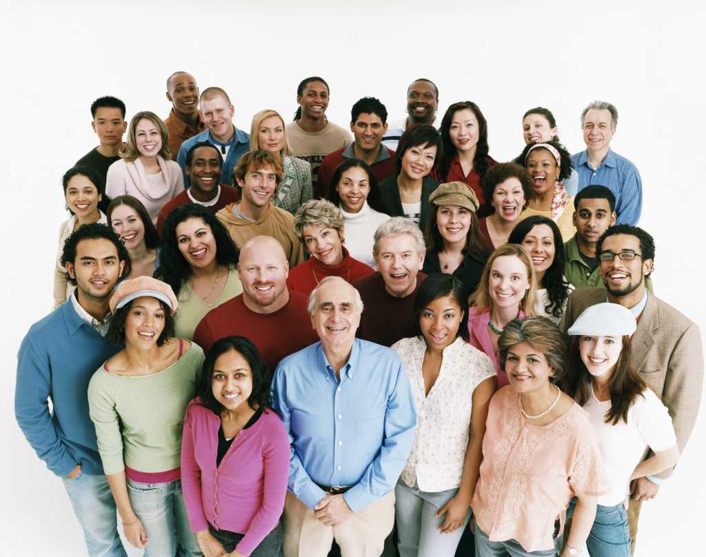 Elevated studio shot of a large mixed age, multiethnic crowd of men and women  dv1954038