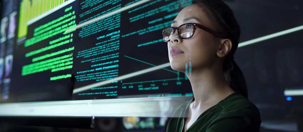 Woman looking at data on a screen