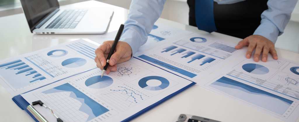 Business analyst checking in financial statement for audit internal control system. Accounting and Financial Concept.
