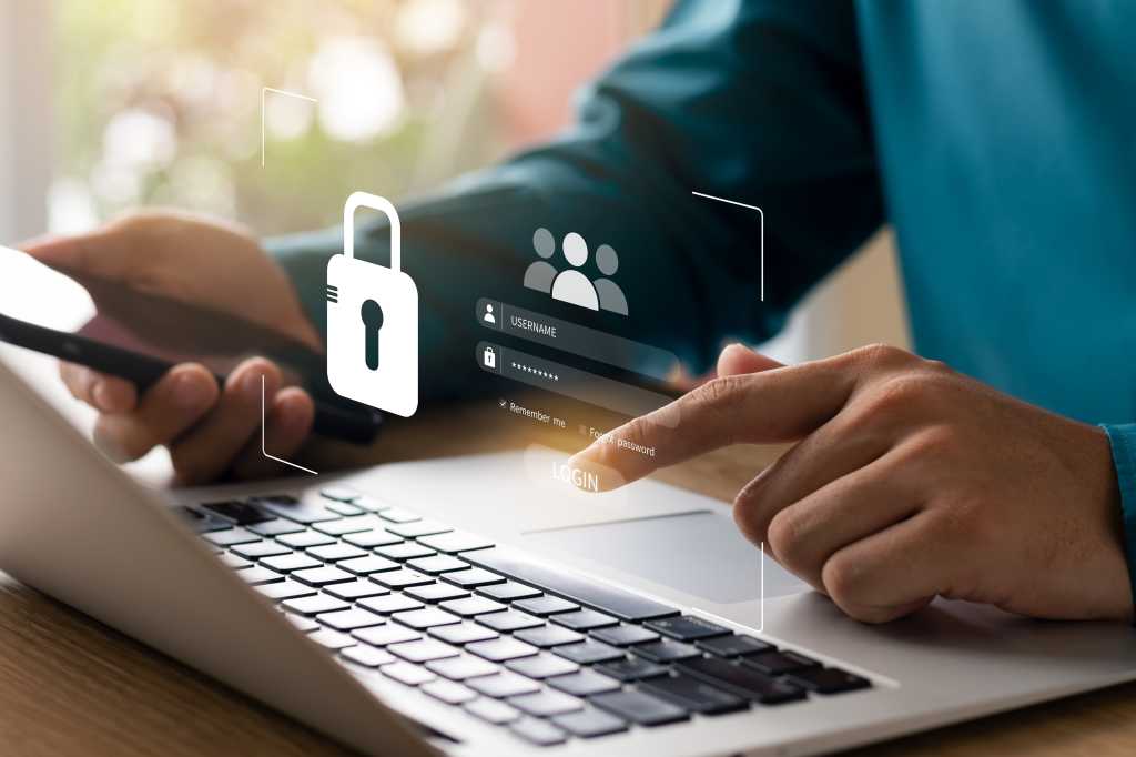 Cybersecurity and privacy concepts to protect data. Lock icon and internet network security technology. Businessmen protecting personal data on laptops and virtual interfaces.